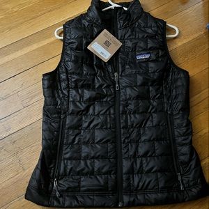 Woman’s medium size black Patagonia puffer vest
